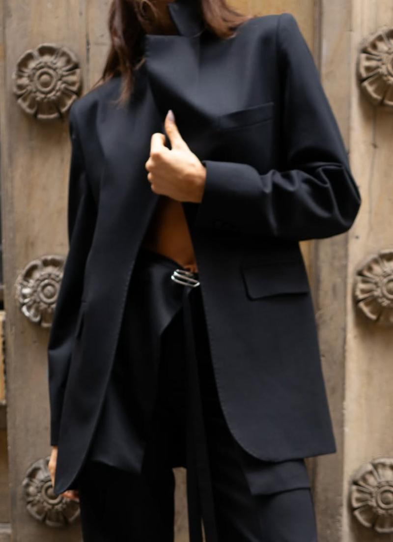 Model wearing a black blazer