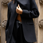 Model wearing a black blazer