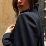 Model wearing a black blazer