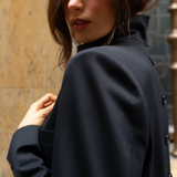 Model wearing a black blazer