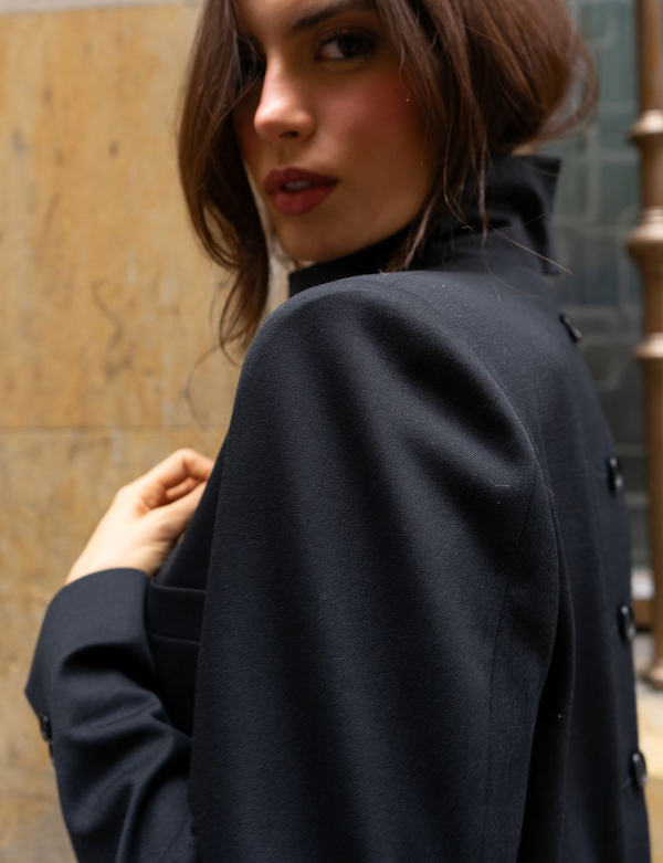 Model wearing a black blazer