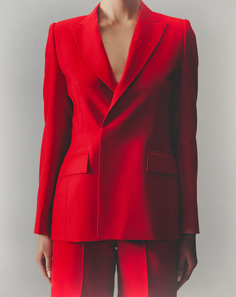 Model wearing a red blazer