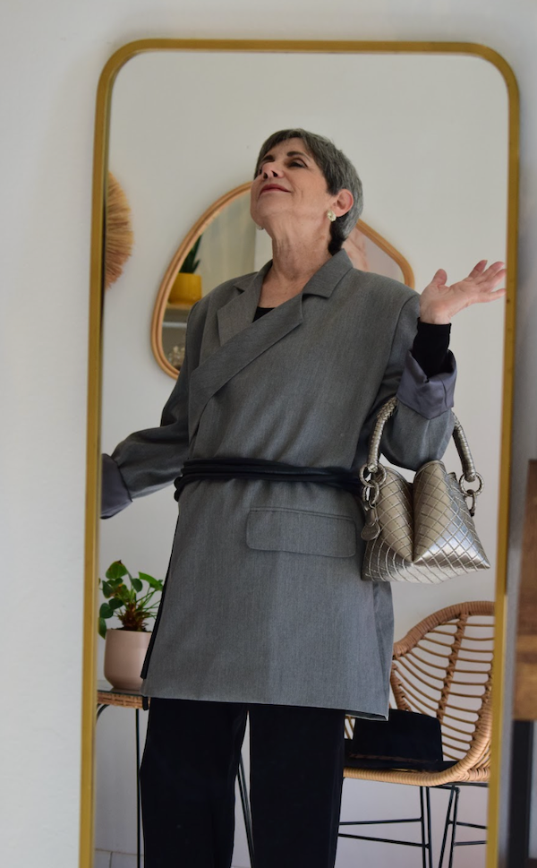 Model wearing a gray oversized blazer