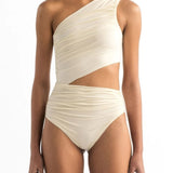 Front of model wearing the Diana One Piece swimsuit by Encantadore Swimwear. It has a cutout on the waist and one-shoulder look.