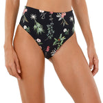 Close up image of a woman. She's wearing a swimsuit with flowers. The purpose of this image is to highlight the swimsuit.